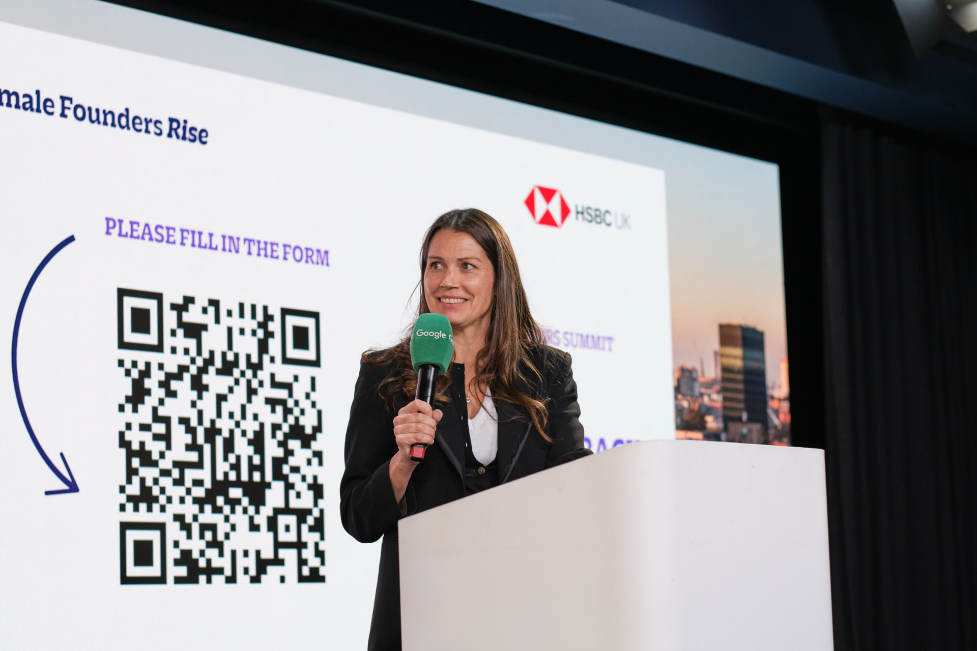 Emmie Faust speaking at a Female Founders Rise summit